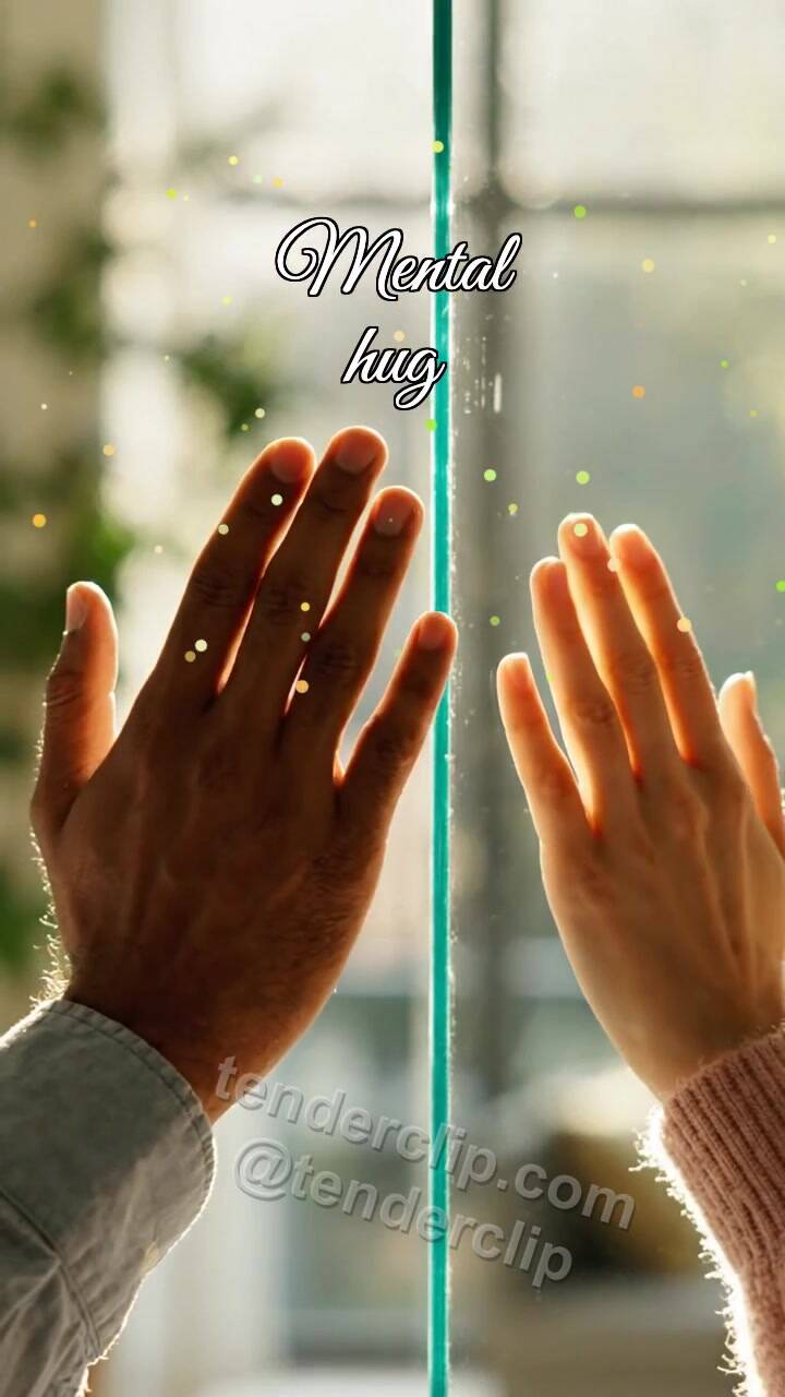 Mental hug: palms meet through glass