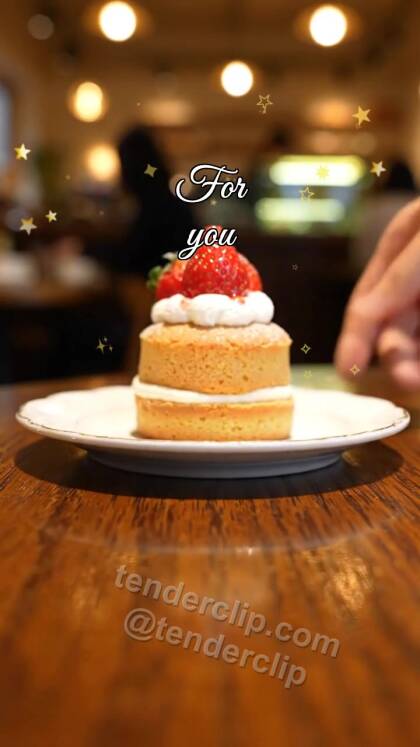 For you: dessert slides across a cafe table toward the viewer