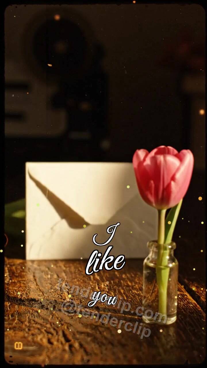 I like you: shy envelope hides behind a flower