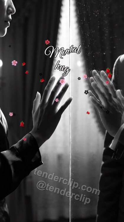 Mental hug: palms meet through glass