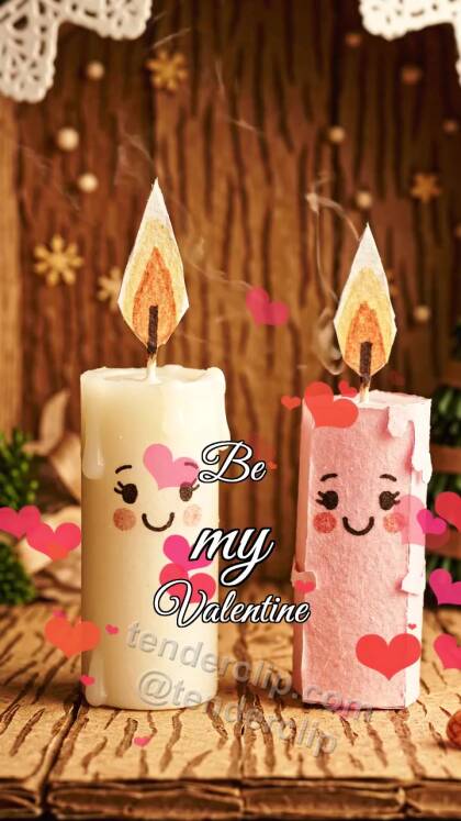 Be my Valentine: two candles lean together