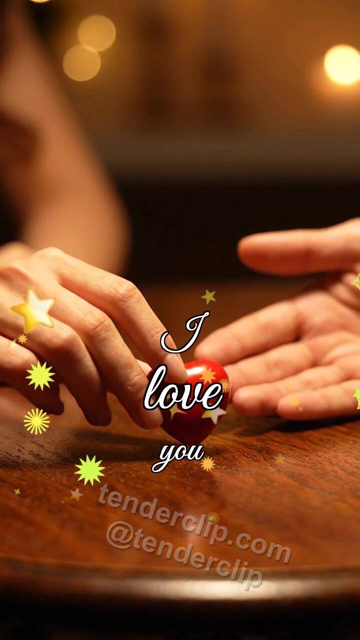 Animated greeting card about I love you: two hands hold a heart
